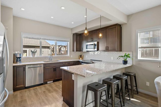 104 Masters Manor Se, Home with 4 bedrooms, 3 bathrooms and 2 parking in Calgary AB | Image 5