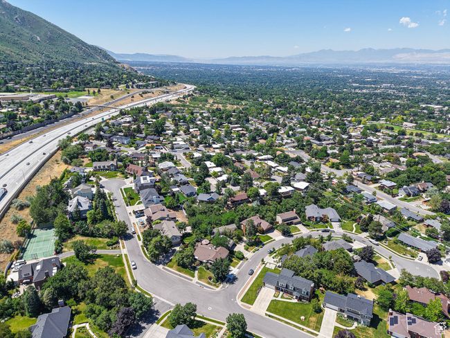 View of property location with a mountainous background and nearby suburban area | Image 84