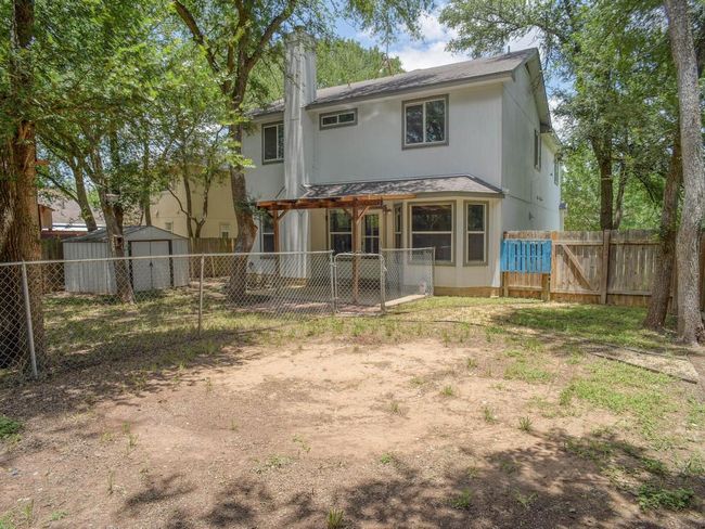 Fenced area within the back yard was used for a pool. Could also be a dog run. | Image 32