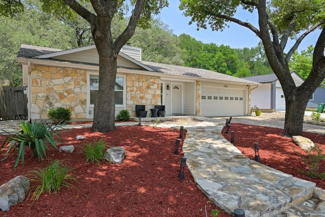 Beautifully updated, this home is a rare blend of city access and natural surroundings. | Image 6