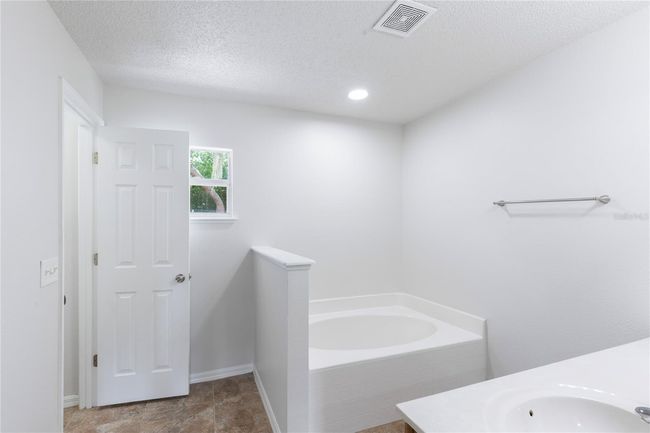 14006 Amero Ln, House other with 4 bedrooms, 2 bathrooms and null parking in Spring Hill FL | Image 25