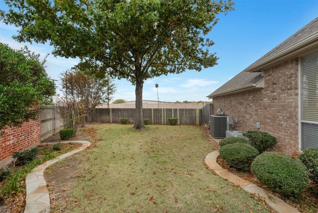 View of yard featuring central AC unit | Image 35