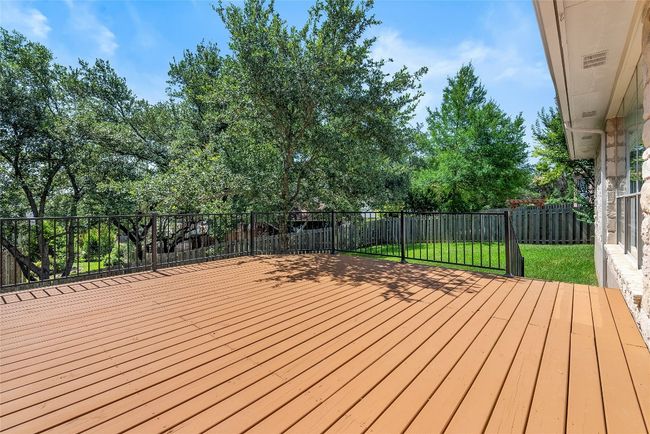 The deck provides a private retreat where you can take in the views and enjoy the peace of your tree-lined backyard | Image 32