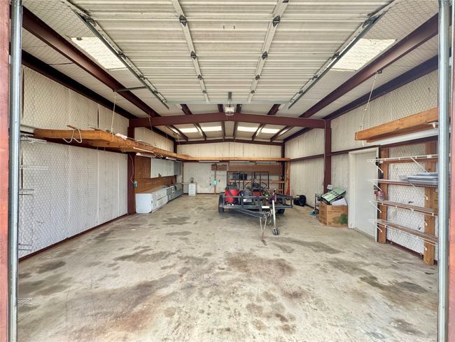 Garage with a garage door opener | Image 39