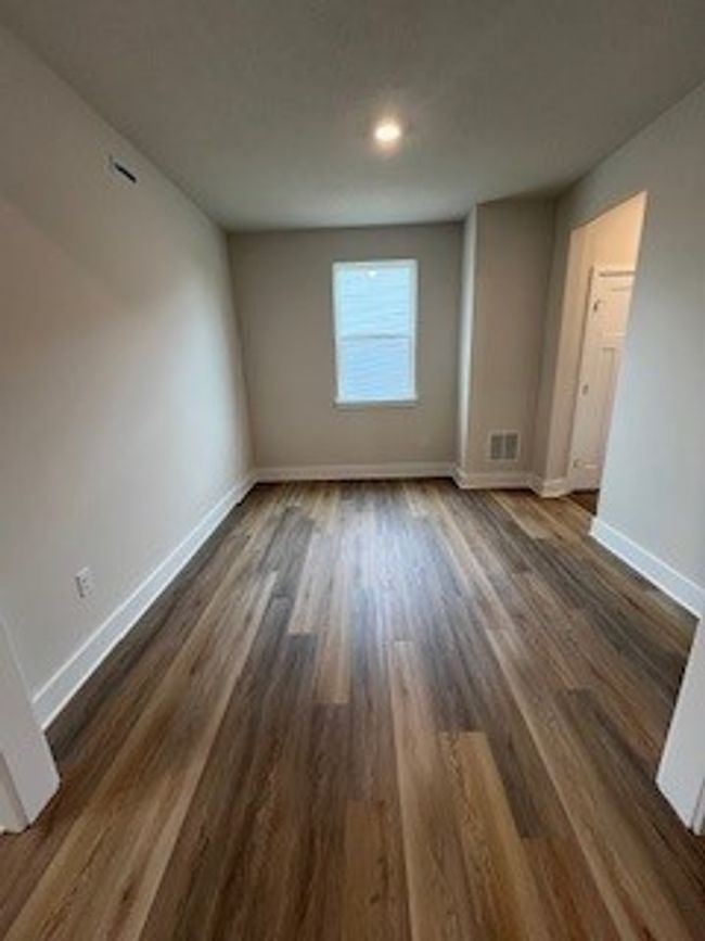 Dining Room with butler pantry access to kitchen | Image 12