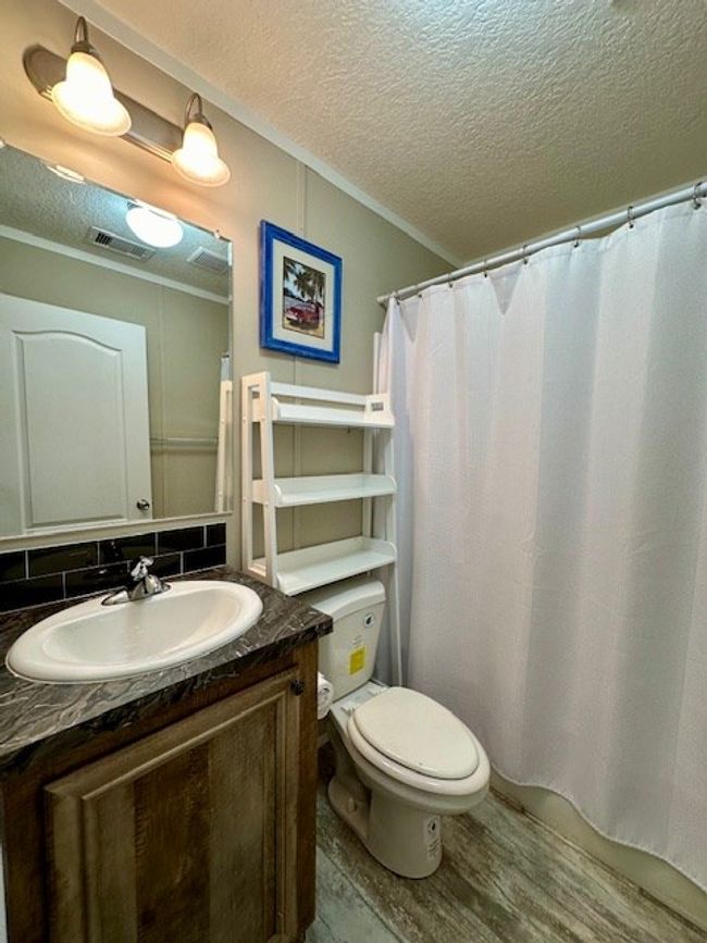 135 Balboa St, House other with 2 bedrooms, 2 bathrooms and 3 parking in Port St. Joe FL | Image 13
