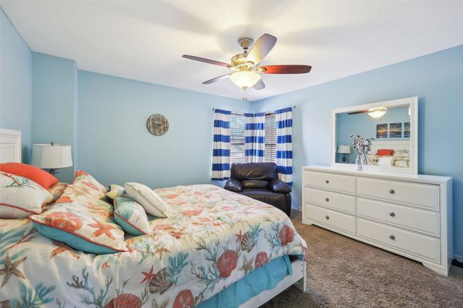 Bedroom 5 is very spacious and has a large closet. | Image 32