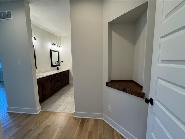 Mudroom with light wood-style floors and baseboards | Image 25