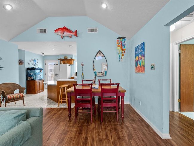 Dining room is open to Family Room and kitchen. | Image 7