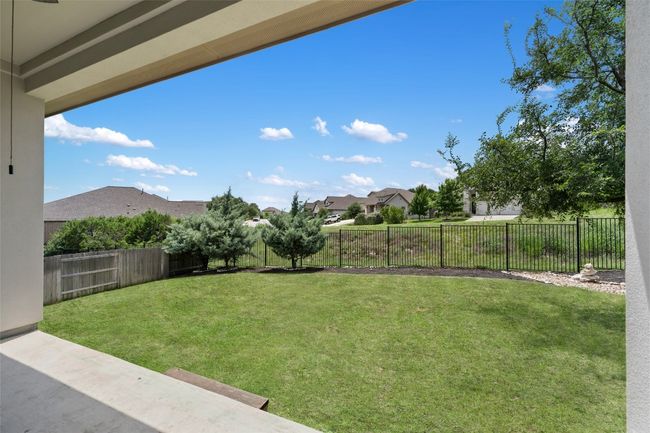 Fenced backyard featuring a patio | Image 31