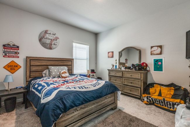 Bedroom featuring light colored carpet | Image 20