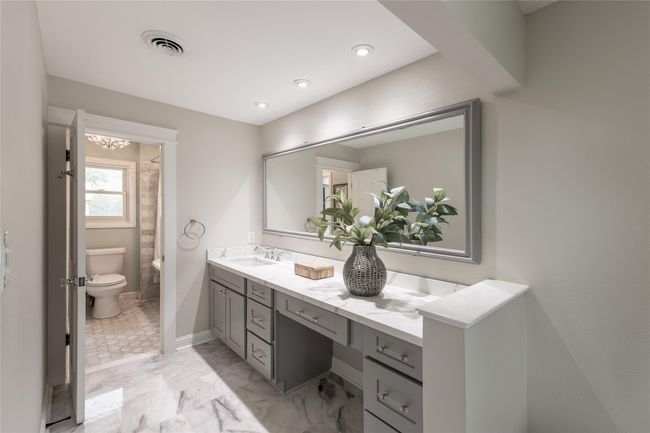 Recently updated marble floor in the Jack and Jill bathroom | Image 29