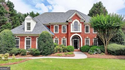 5920 Ettington Drive, House other with 6 bedrooms, 5 bathrooms and 3 parking in Suwanee GA | Image 1