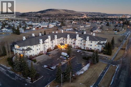 101-72 Quigley Dr, Cochrane, AB, T4C2K6 | Card Image
