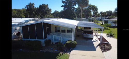 116 Lyonia Ln, WILDWOOD, FL, 34785-9201 | Card Image