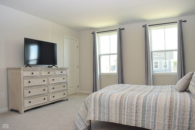 primary bedroom has two walk in closets | Image 27
