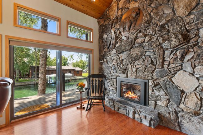 Stone fireplace with historic bronze inlay | Image 7
