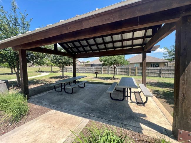 View of property's community with a patio area | Image 35