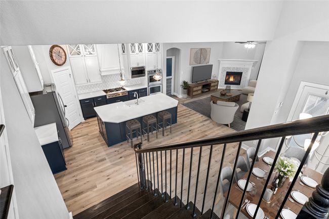 Staged from stairs to kitchen dining and living room | Image 5