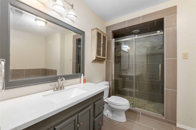 Primary bathroom with separate walk in shower | Image 19