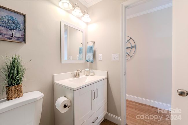 New vanity and lighting in hall bath! | Image 25