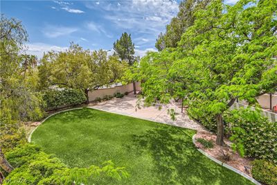 Primary Balcony view West Yard & Basketball court (not a drone shot) | Image 3