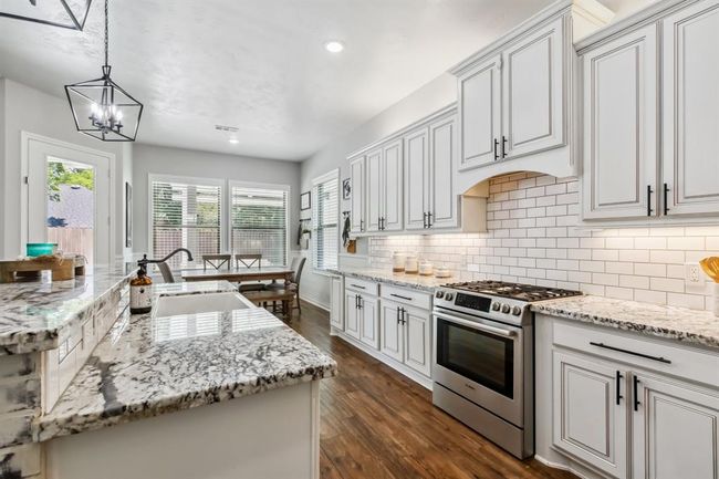Beyond the main features, the kitchen also includes sophisticated under- and over-cabinet lighting. | Image 15