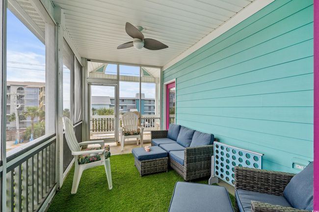 Sunroom with outdoor lounge area, ceiling fan, and a healthy amount of sunlight | Image 28