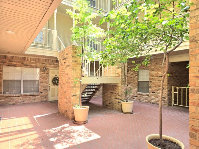 View of patio / terrace featuring stairs | Image 18