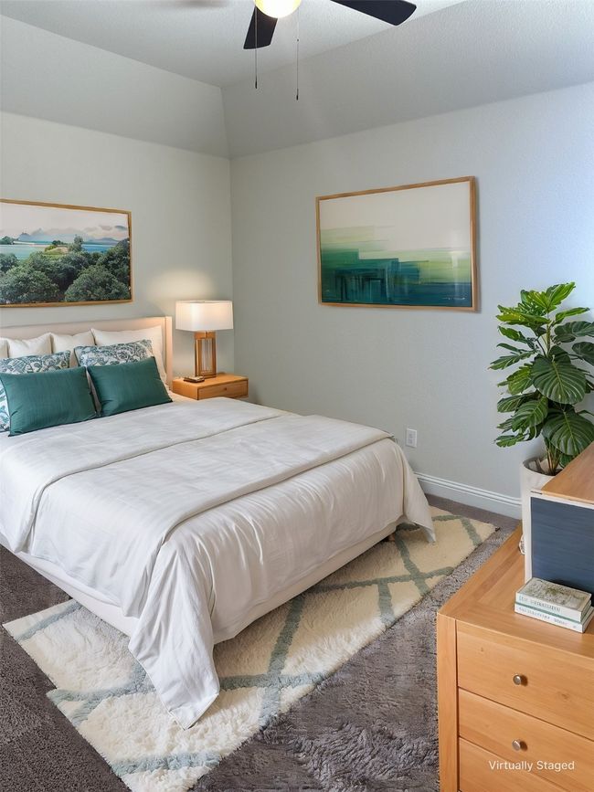 Bedroom with ceiling fan and baseboards | Image 20