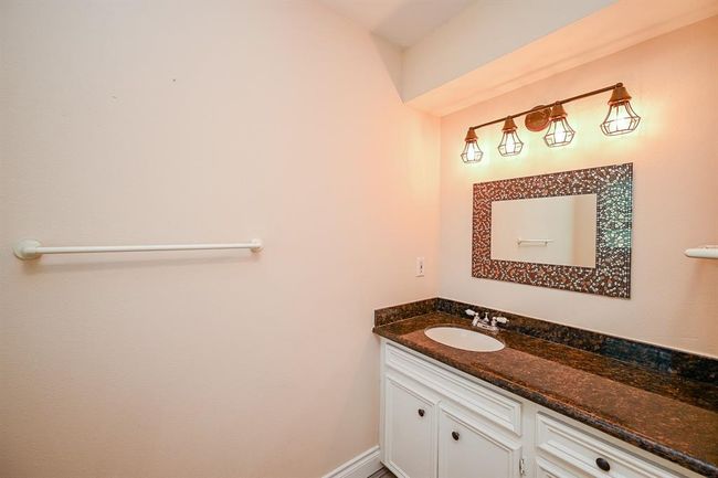 The secondary bathroom allows multiple family members to prepare for the day, as well as, settle-in for the evening. | Image 25