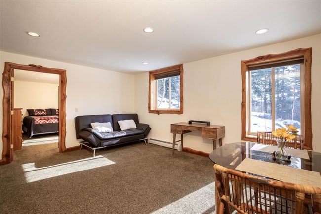 Lower level living room & dining area | Image 63