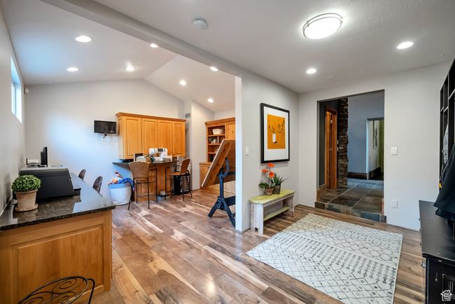 Entrance foyer with light wood-type flooring, recessed lighting, and vaulted ceiling | Image 36