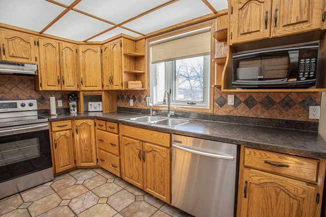 10701 104 Street, House other with 4 bedrooms, 3 bathrooms and 4 parking in High Level AB | Image 16