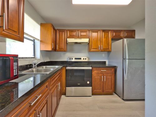 apt-104-6001 Shakerwood Cir, Tamarac, FL, 33319-2360 | Card Image