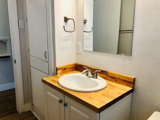 Bathroom featuring vanity and wood finished floors | Image 5