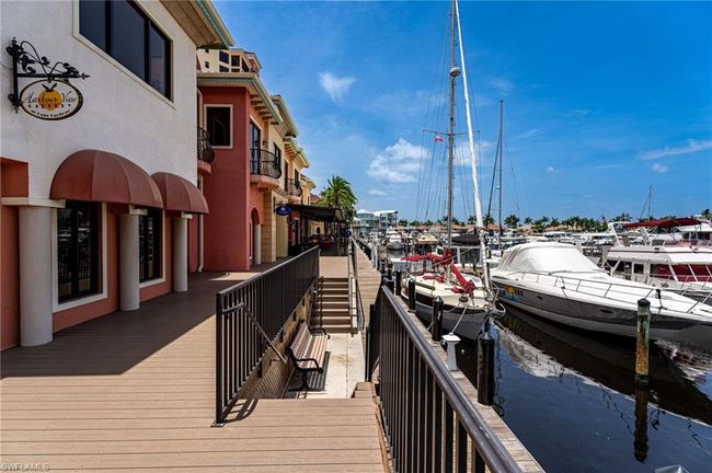Dock area featuring a water view | Image 46