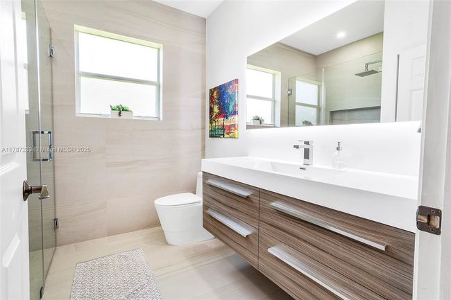 3848 Oak Ridge Cir, House other with 4 bedrooms, 3 bathrooms and null parking in Weston FL | Image 38