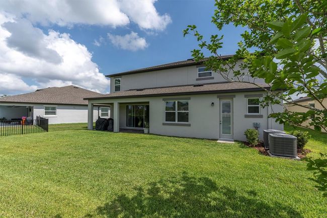 4496 Tatum Loop, House other with 4 bedrooms, 3 bathrooms and null parking in ODESSA FL | Image 47