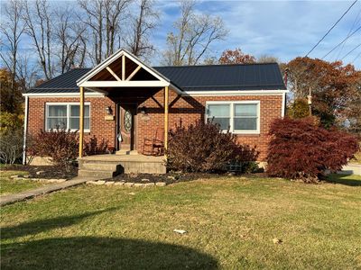 Lovely brick ranch on corner lot. | Image 1