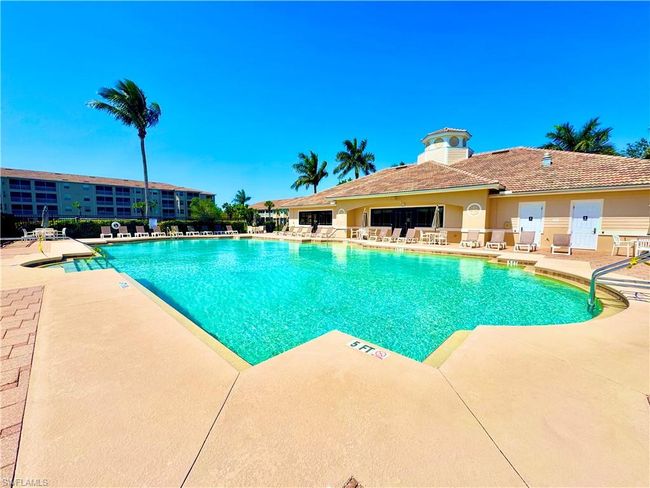 Pool with a patio area | Image 28