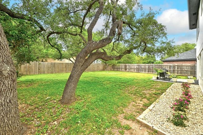View of yard featuring a fenced backyard | Image 34