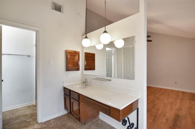 Sink area separated from the shower. | Image 25