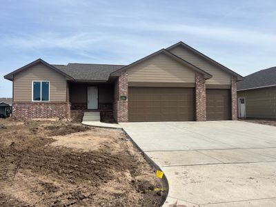 Ranch-style house with a garage | Image 1