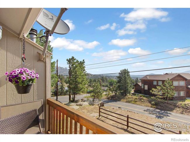 A balcony off the primary bedroom is a great place to enjoy the sunrise or watch the stars at night. | Image 13