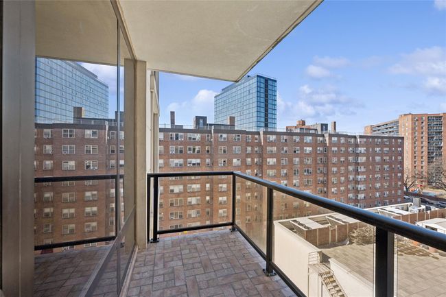 Balcony featuring a city view | Image 14