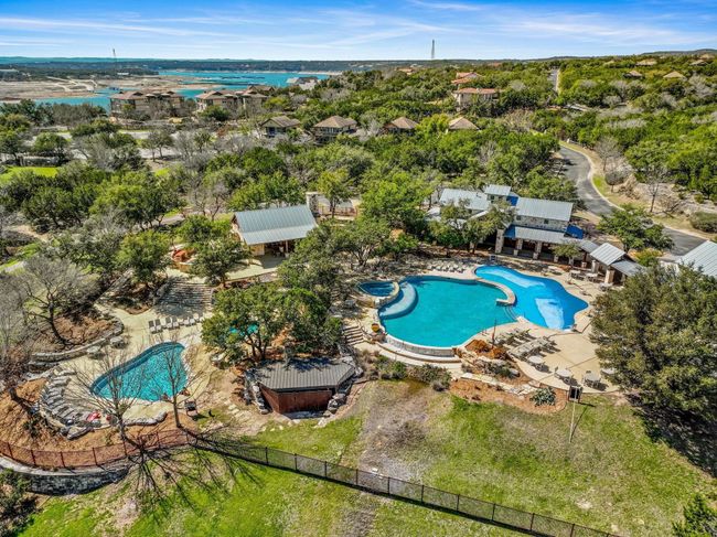 The Beach Club has a fitness center, four pools, two grills, hot tub, smoker, fireplace, volleyball court, picnic area, playground, kayak dock and a full service seasonal restaurant, The Wild Hare Bar & Grill. The Beach cCub and fitness center are open 365 days a year from 6 am-10 pm. | Image 44