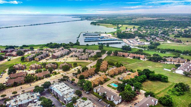 Aerial view of property and surrounding area with a nearby body of water | Image 19
