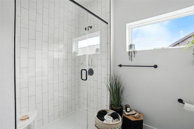Bathroom with a stall shower | Image 10