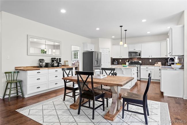 8' custom built storage cabinets with soft close drawers and butcher block top adds to the overall functionality | Image 8